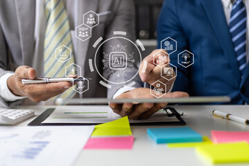 Businessman discuss business analysis, finance, investment and marketing on modern tablets.