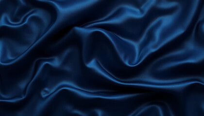 Obraz premium Crushed silk texture in rich navy blue with subtle ripples and folds illuminated to create highlights, copy space