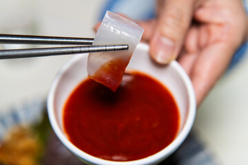 squid sashimi and chili pepper sauce