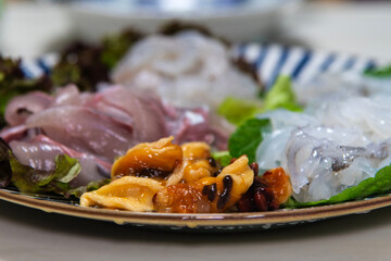 sea pineapple sashimi on the dish