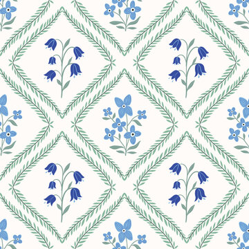 Vintage seamless pattern with bluebells and forget-me-not and green branches, elegant wallpaper, trendy romantic background