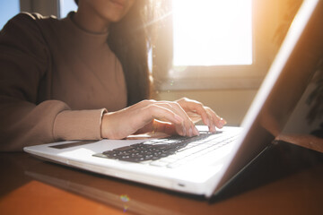 woman working on laptop computer