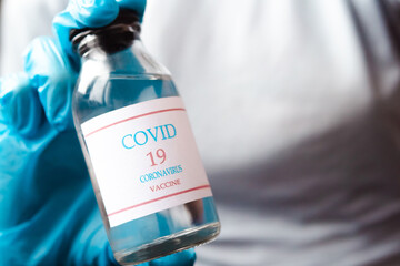 Development and creation of a coronavirus vaccine COVID-19 .Coronavirus Vaccine concept in hand of...