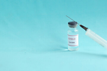Coronavirus vaccine bottles and syringe injection. Prevention and treatment from corona virus...