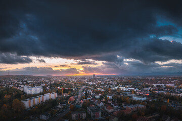 Dramatic Sunset Over a Vibrant Cityscape