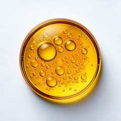 Round golden yellow oil drop with bubbles inside isolated on the white background. Skincare or hair care cosmetic ingredients like niacinamide, omega-3, biotin, collagen, ceramides and more