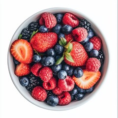 Obraz premium A bowl of mixed berries including strawberries, blueberries, and raspberries
