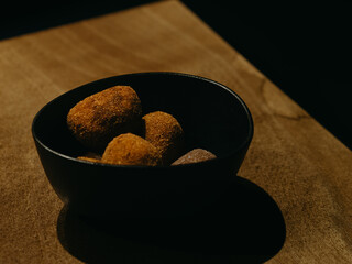 Croquettes on a wooden table