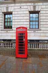 Fototapeta premium London UK red phone booth in rainy weather