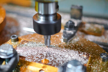 Precision milling process crafting clockwork cases in a manufacturing workshop © nordroden