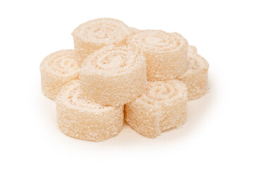 Coconut candy roll isolated on a white background.