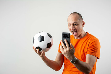 happy excited fan in euphoria mood after winning in a bet with a smartphone in hand on isolated...