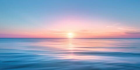 Fototapeta premium A serene sunset over the calm waters of an ocean