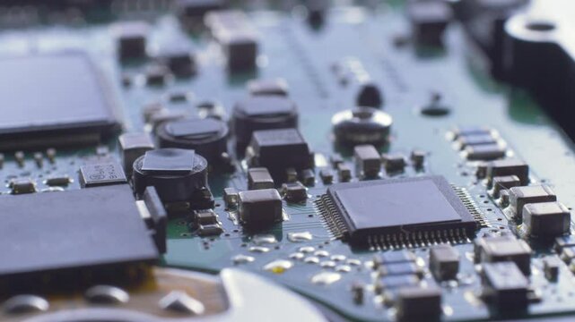 Printed circuit board with many electrical components. Computer hardware technology concept