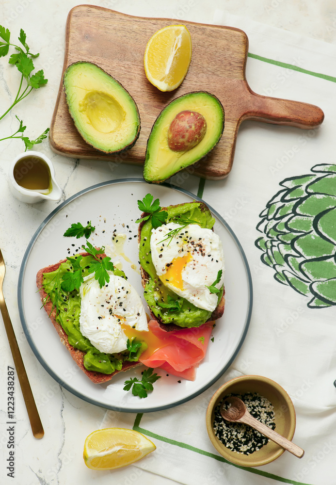 Wall mural Whole grain toast with avocado and poached egg. for breakfast  .Healthy appetizer.