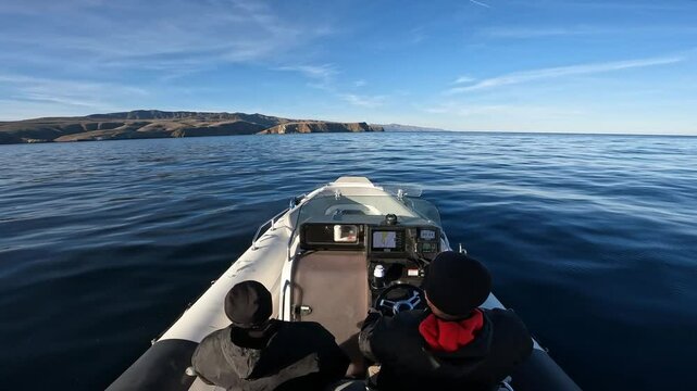 Small fast boat heading to Santa Cruz Island.