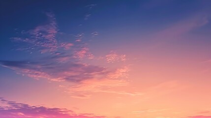 Fototapeta premium Sky at twilight with a gradient of colors transitioning from orange to deep blue.