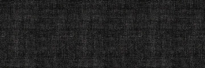 Dark Textured Fabric:  A close-up shot revealing the rich texture and deep black hue of a luxurious fabric.  Perfect for adding a touch of sophistication and depth to your designs.