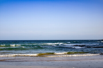 Stunning ocean view from Bondi Beach, Sydney, Australia. Captures the crystal-clear waters, vibrant...