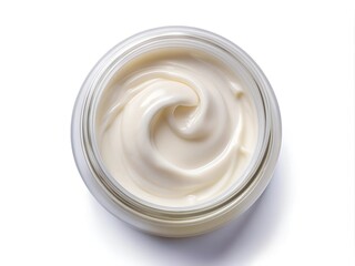 A smooth, creamy substance swirls gently inside a clear glass jar, showcasing its rich, velvety texture perfect for skincare and nourishing routines. Ideal for self-care moments
