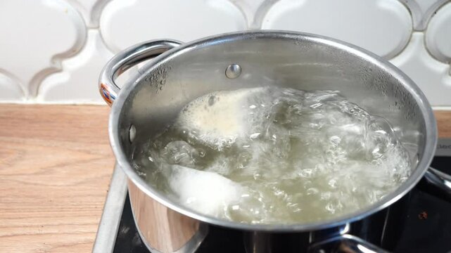 Close up of boiling water in a pot