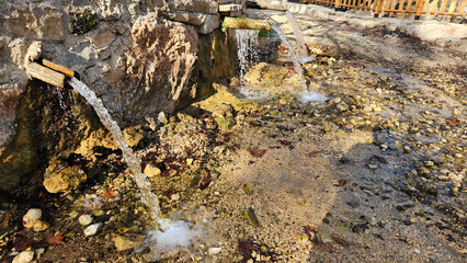 Water fountain troughs, carved from a tree trunk, used for drinking water in the Dokuzoluk Recreation Area of the Taurus Mountains.