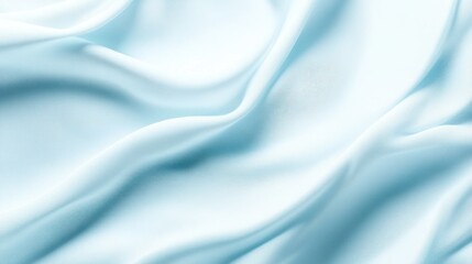 Fototapeta premium Smooth Pale Blue Fabric Draped in Soft Waves