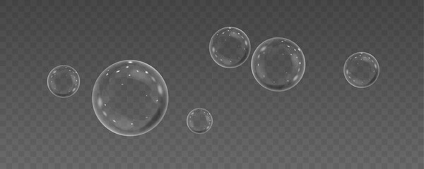 Realistic soap bubbles vector, png on a transparent background. Flying and falling soap bubbles.	