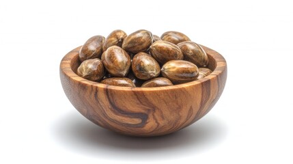 Pile of Sterculia monosperma Seeds in Wooden Bowl