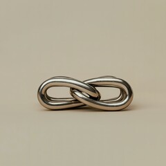 Fototapeta premium Interlocked Metal Rings on a Neutral Backdrop