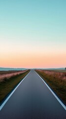 A solitary bike lane with a clean, straight path and soft pastel-colored background, creating a sense of calm and openness