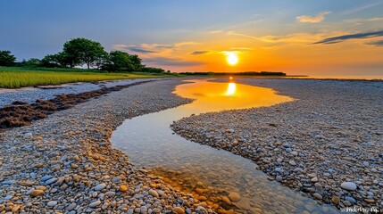 Tranquil Sunset over Coastal Tidal Pool and Pebble Beach