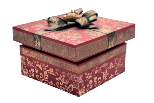 Elegant gift box adorned with intricate designs and a golden ornament perfect for celebrations or special occasions isolated on transparent background