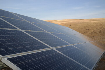 energy panels that generate electricity from the sun. Power plant using renewable solar energy with...