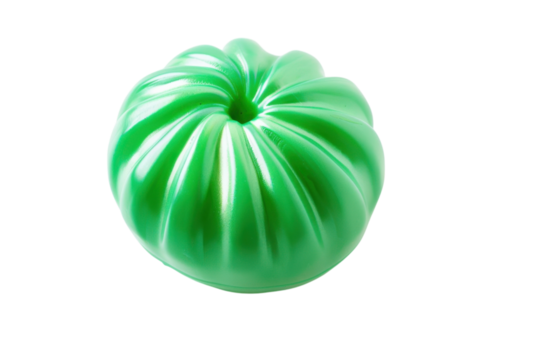 A vibrant green molded shape resembling a playful, oversized fruit resting against a clean white background isolated on transparent background