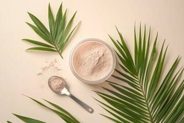 Collagen powder in a measuring spoon atop palm leaves on a soft beige backdrop Top view blank space