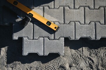Laying paving stones. Paving tools for use