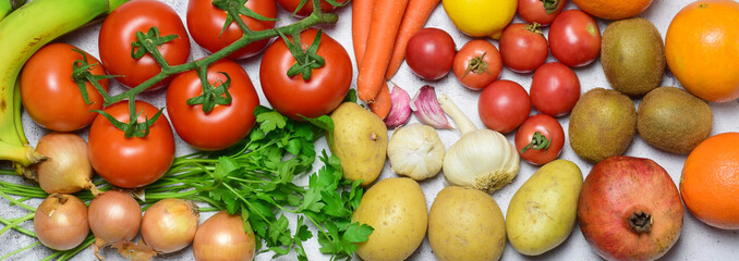 Zenith view. Background with healthy food, variety of vegetables and fruits, panoramic format.