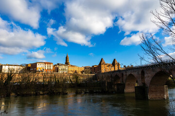 Panorama of Montauban city center with the Ingres Museum and Saint-Jacques Church, seen from the Tarn riverbank