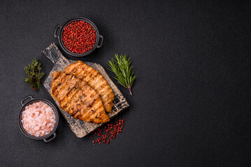 Delicious fresh grilled chicken fillet with spices and herbs