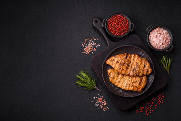 Delicious fresh grilled chicken fillet with spices and herbs