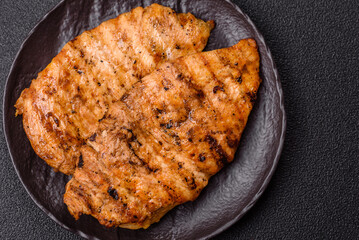 Delicious fresh grilled chicken fillet with spices and herbs