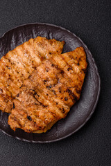 Delicious fresh grilled chicken fillet with spices and herbs