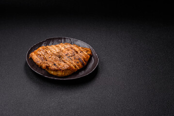 Delicious fresh grilled chicken fillet with spices and herbs