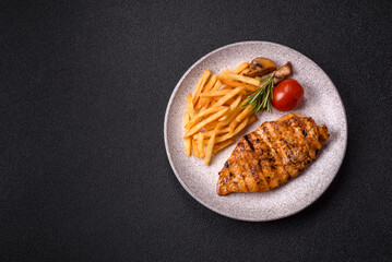 Delicious fresh grilled chicken fillet with spices and herbs