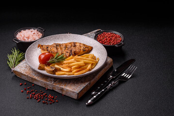 Delicious fresh grilled chicken fillet with spices and herbs