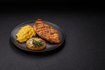Delicious fresh grilled chicken fillet with spices and herbs
