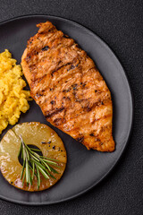 Delicious fresh grilled chicken fillet with spices and herbs