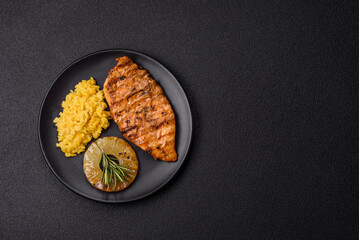 Delicious fresh grilled chicken fillet with spices and herbs
