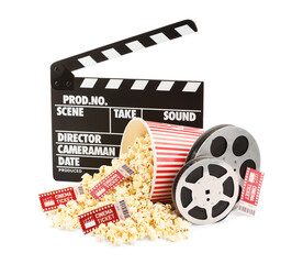 Tasty popcorn, film reels, clapper and movie tickets isolated on white